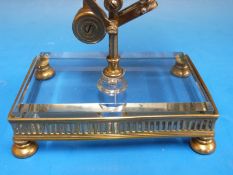 A set of pendulum type letter scales, with ivorine scale calibrated up to 100, marked E.W.