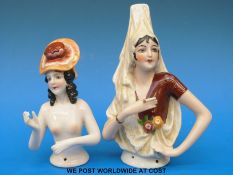 Two Art Deco ceramic half dolls in the form of a lady in an elaborate headdress the other of a nude