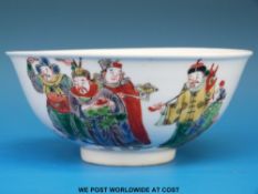 A 19thC / early 20thC Chinese famille verte bowl decorated with figures (13.