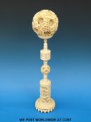 A 19thC Chinese ivory puzzle ball on stand (stand 32cm tall)