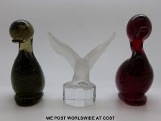 Two Whitefriars control bubble glass ducks in ruby and brown (14.
