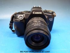 A Canon eos 850 SLR camera,