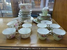 An Aynsley bone china tea service and one other service
