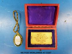 A 1903 Newmarket private stand enamel pendant, numbered 552 and with value £5 to back,