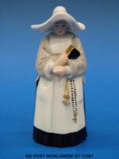 A Royal Worcester abbess / nun candle snuffer with puce mark