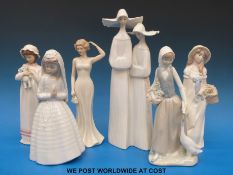 A group of Lladro, Nadal, SBL and Nao ladies to include two nuns,