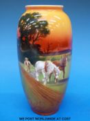 A c1920's Royal Doulton vase with hand painted scene of heavy horses ploughing furrows (height 8