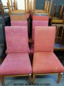 Twelve pink upholstered chairs