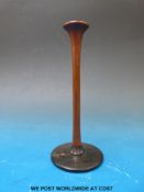 A c1900 wooden monaural stethoscope with ebonised 'diaphragm'