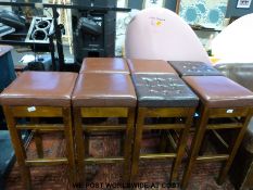 Seven faux leather and oak barn stools