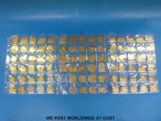 A good collection of 88 coal miners' tokens from Wales,