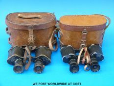 A leather cased pair of Carl Zeiss Jena 12 x 30 MG97102 binoculars together with another cased set,