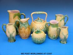 A set of four graduated corn on the cob majolica jugs,