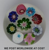 Clichy spaced millefiori glass paperweight with nine various canes including a signature pink,