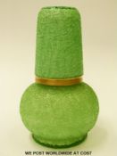 Bacarrat carafe and up with green textured body decorated in gilt to the rim and stopper (H18cm)