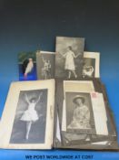 Two photo-postcard albums.