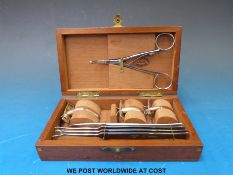 A cased portable paediatric emergency traceaostory set stamped 'The Medical Supply London',