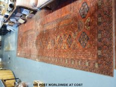 A large wine ground rug