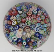 Baccarat close pack millefiori glass paperweight with five silhouette canes depicting a dancing