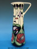 A Moorcroft ewer decorated in the Charles Rennie Mackintosh style,