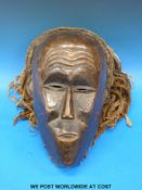 A Chokwe (Angola) mask with braided hair (bought in the 1960's from an English Ex pat teacher