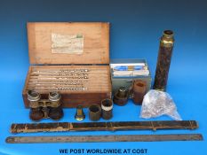 A three-draw leather and brass telescope, vintage binoculars, lenses in cases,