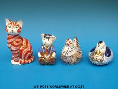 Four Royal Crown Derby paperweights including Schoolboy Teddy