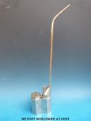 A Chinese Paktong opium pipe with engraved scene of a sage and young boy (45cm tall)