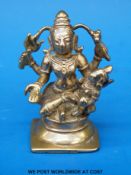 A 19th century Indian bronze figure of a multi armed deity (7cm tall)