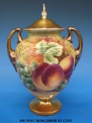 A Royal Worcester painted fruit two-handled, lidded pedestal vase,