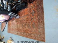 A large wine ground rug