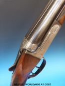 Unnamed Belgian 20 bore side by side ejector shotgun with moulded and engraved decoration,