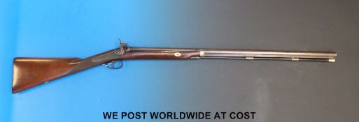 Durs Egg 19 bore single barrel muzzle loading hammer action gun with white metal mounts,