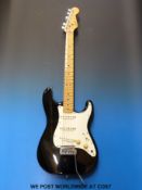 An 1983 Fender Stratocaster electric guitar in case, serial no E316912,
