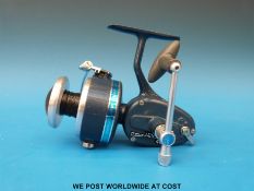 A Mitchell 410A fixed spool fishing reel in soft case with two spare spools, appears unused.