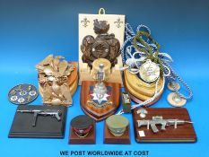 A quantity of military plaques to include Scots Guards, Household Cavalry etc,