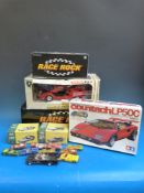 A collection of toys to include Batmobile, Matchbox toys,