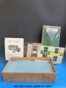 A Mettoy dolls house and garage believed to be complete,