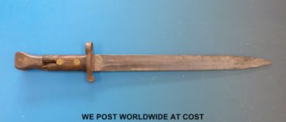 A Wilkinson bayonet marked 9 96 and with WD marks.