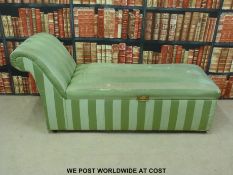 A green upholstered day bed.