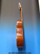 A Kimbara semi acoustic guitar with cut-away body in hard case,