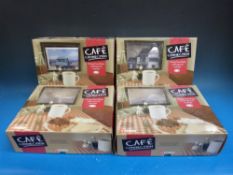 Four Corgi Café Connection diecast model vehicle sets,