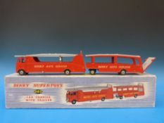 A boxed Dinky Supertoys diecast car carrier with trailer, no.