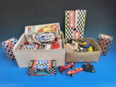 A Scalextric set complete with various cars