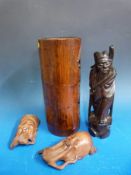 A Chinese 19thC bamboo brush pot together with a Chinese inlaid rosewood figure and two masks