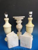 An alabaster carved trumpet vase, a pair of 'book' book ends, lamps etc.