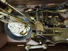 A quantity of brass ware to include fire irons, fire dogs trivet etc.