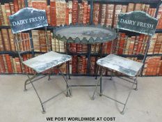 Two folding vintage 'Diary Fresh' chairs and galleried table