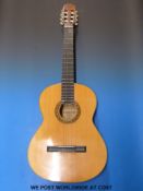 A Leonora six string acoustic guitar, model AG2069A.