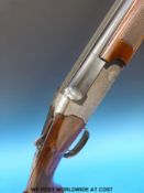 Anglo Zoli 12 bore over and under ejector shotgun with ornate scrolling decoration, single trigger,